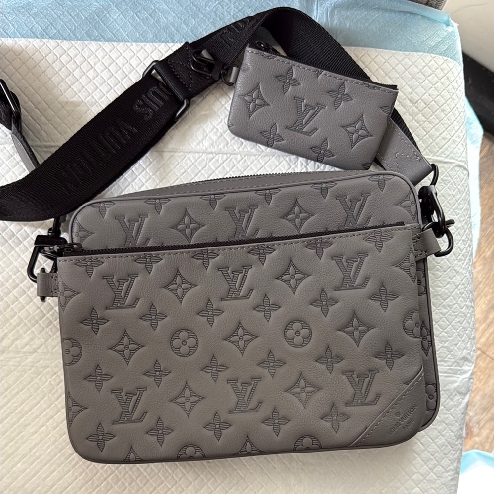Louis Vuitton Gray Messenger Bag with Monogram Design